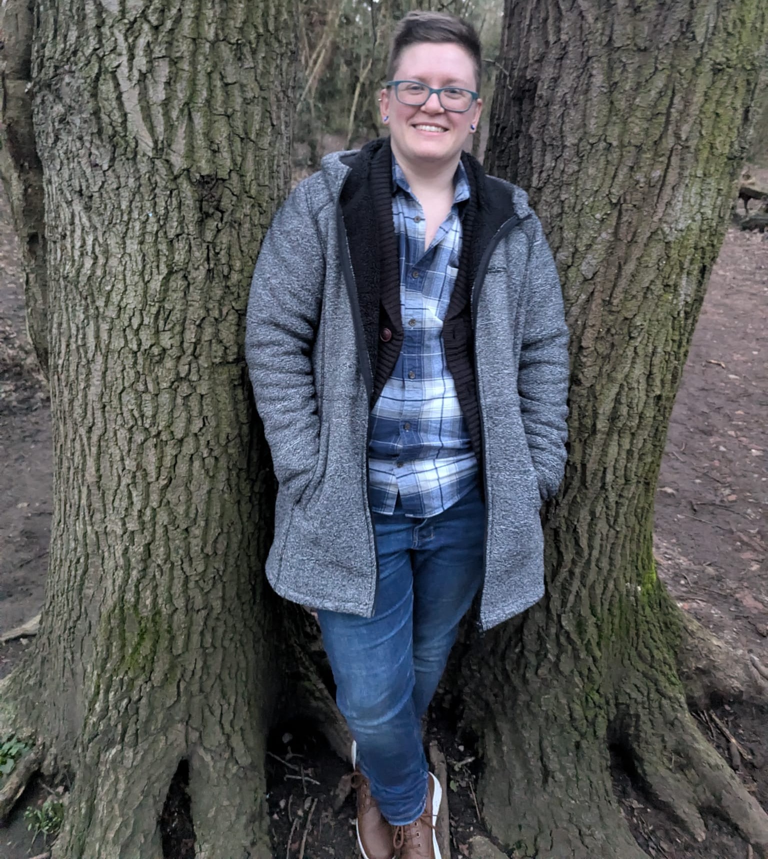 Alex stood in between two trees